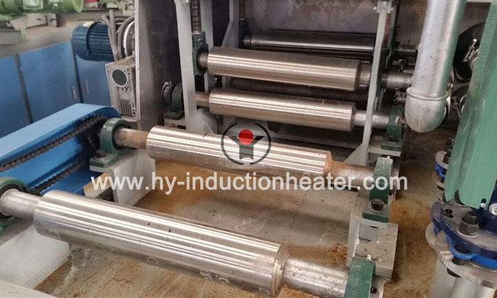 Induction slab heating in a hot rolling process
