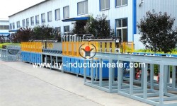 Long bar induction heat treatment machine