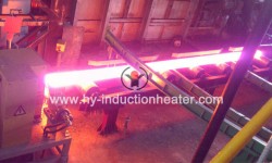 Induction slab heating and preheating machine