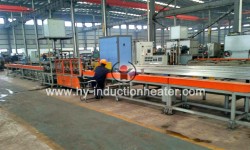 Long bar induction heat treatment machine